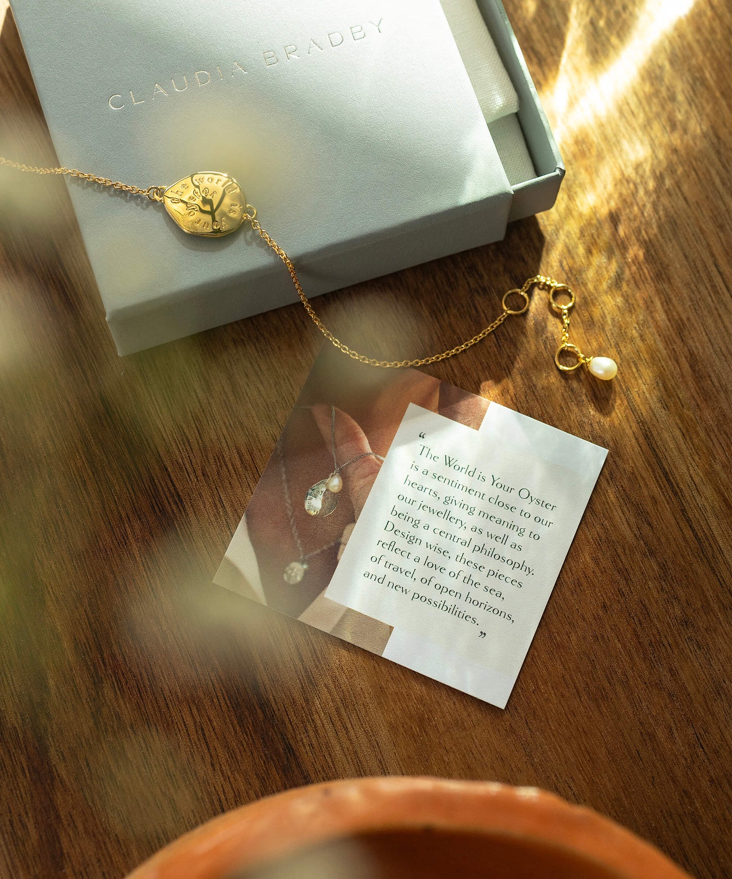 The World Is Your Oyster Gold Bracelet