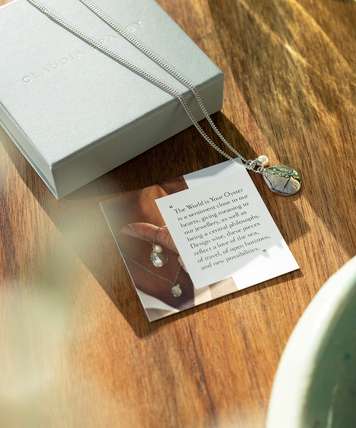 The World Is Your Oyster Silver Micro Necklace