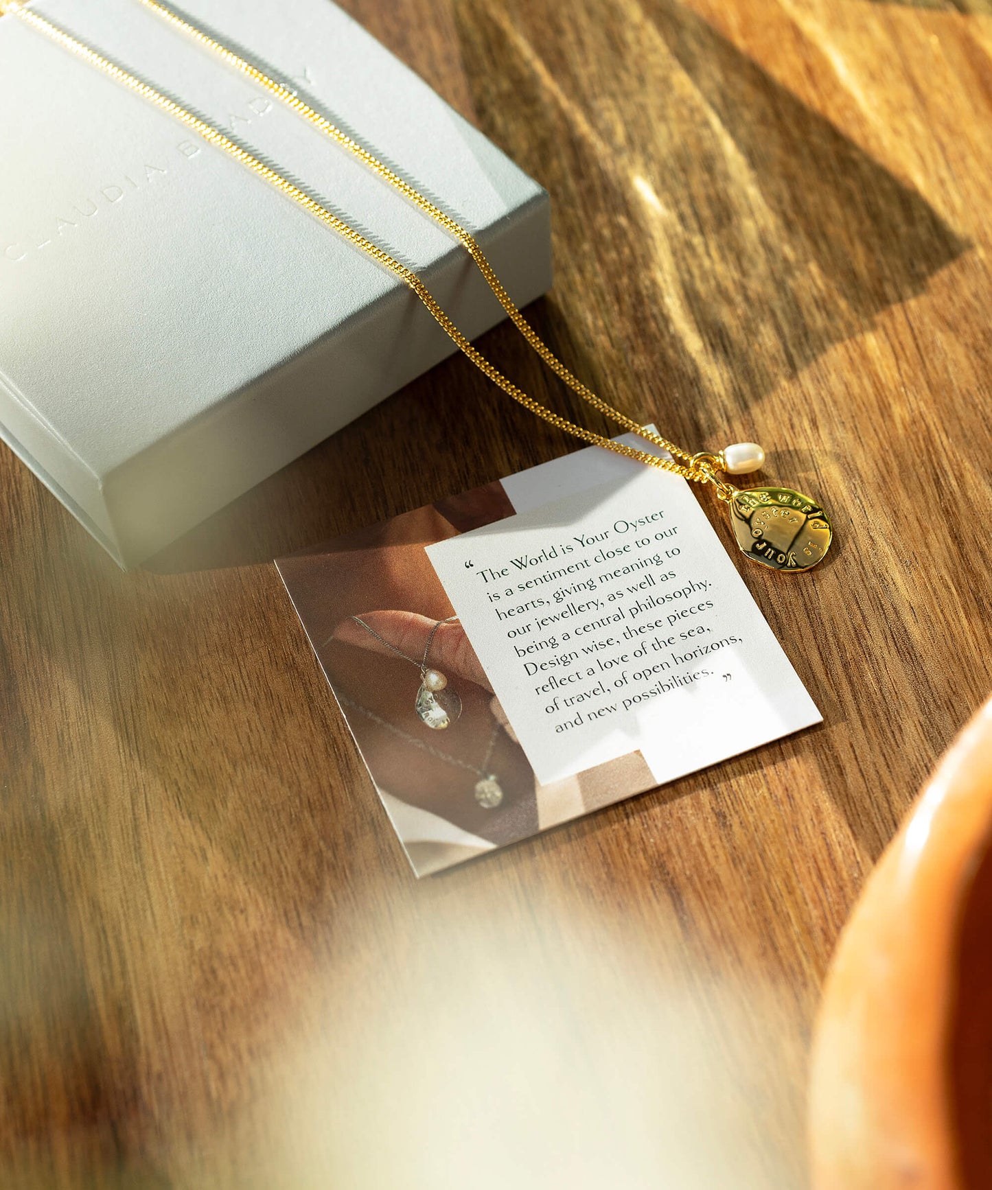The World Is Your Oyster Gold Micro Necklace
