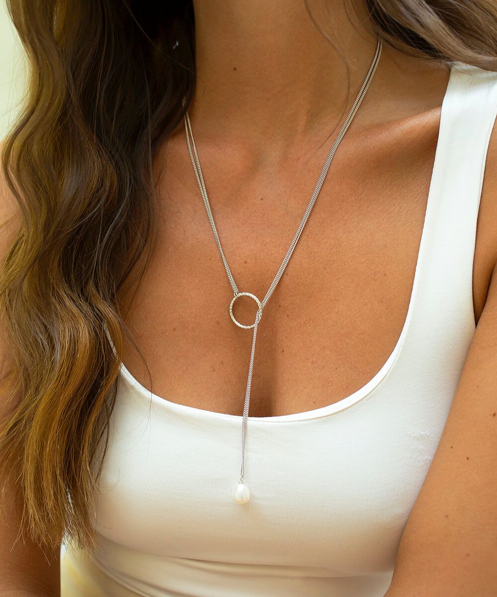 Silver Cirque lariat with white pearl necklace
