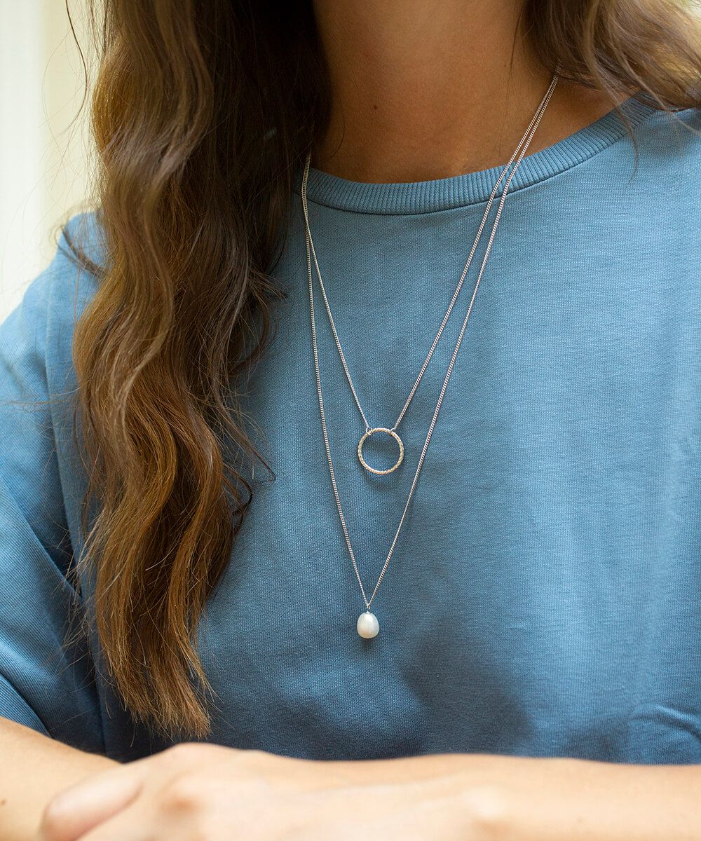 Silver Cirque lariat with white pearl necklace
