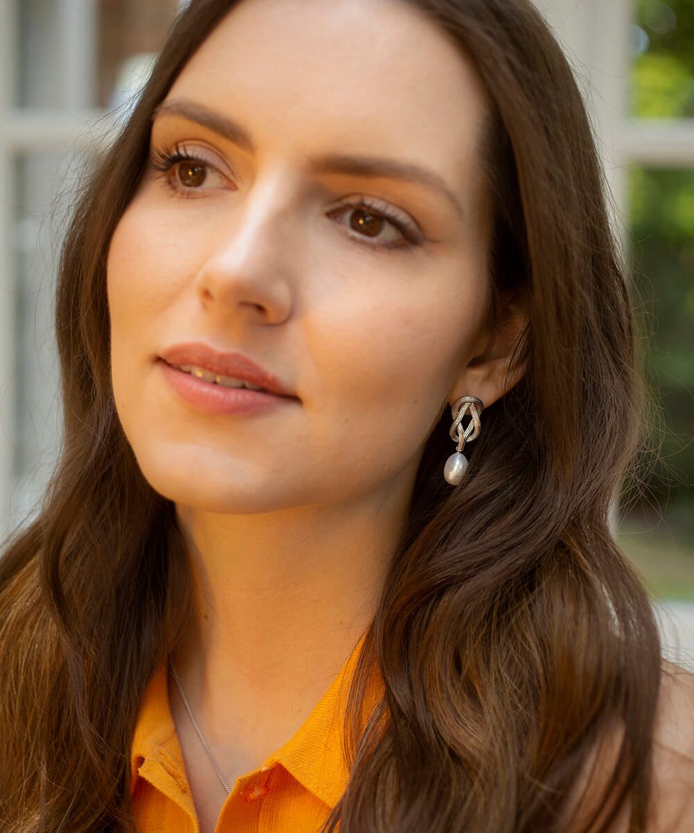 Love knot pearl drop earrings, silver