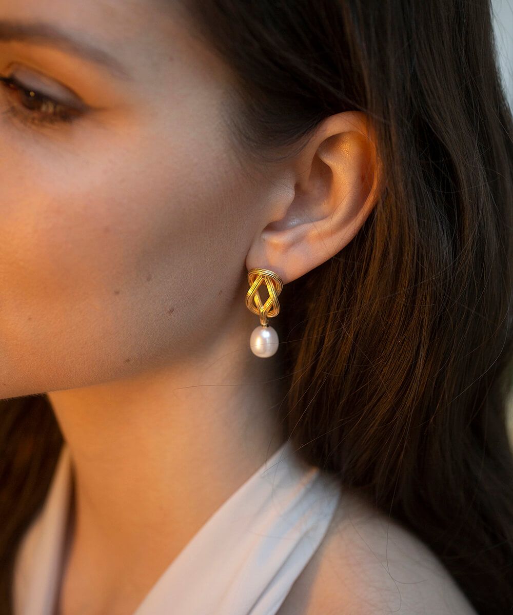 Love knot gold drop earrings