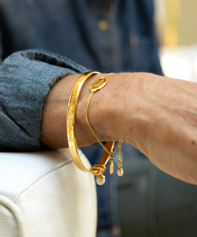 Midlifechic mantra SLIM OVAL gold bangle, with single pearl charm