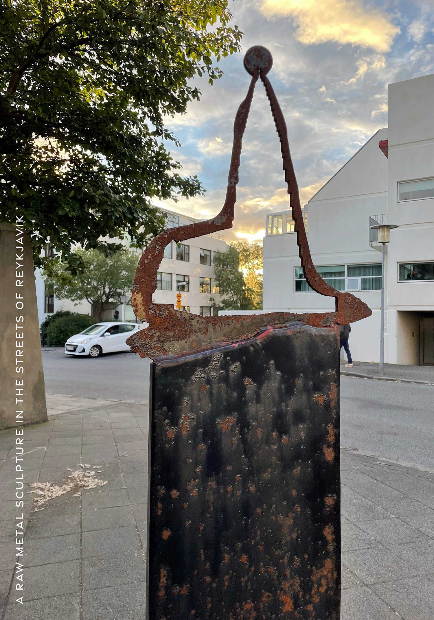 A raw metal sculpture in the streets of reykjavik