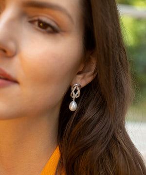 Love knot pearl drop earrings, silver