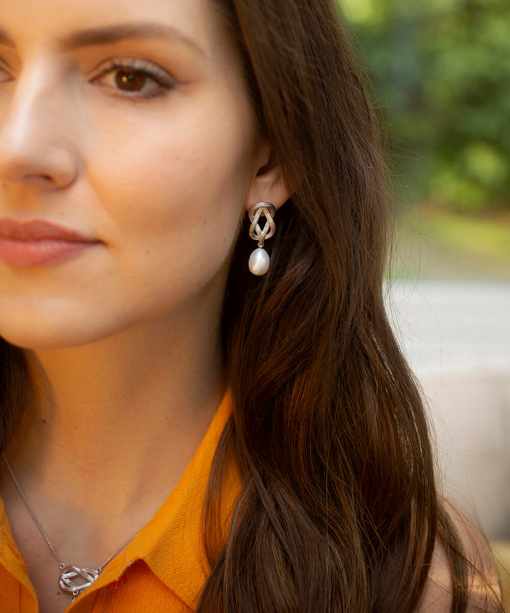 Love knot pearl drop earrings, silver