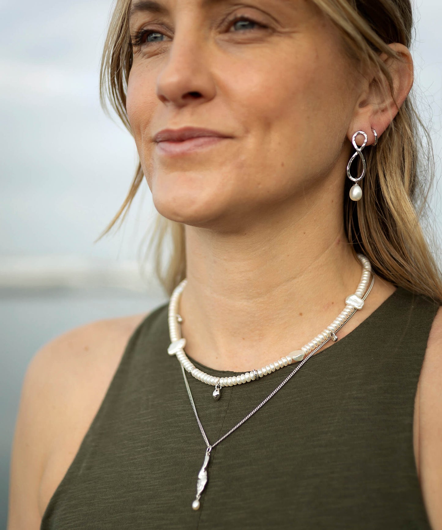 Siren mermaid silhouette earrings, with freshwater pearl drop, silver