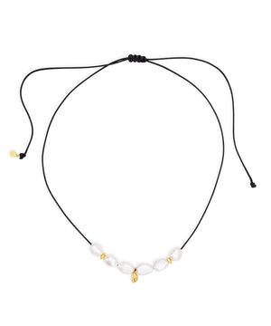 Large Baroque pearl and gold charm necklace, on adjustable cord