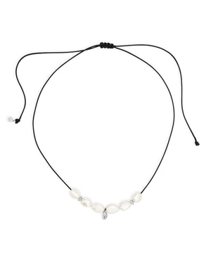 Large Baroque pearl and silver charm necklace, on adjustable cord