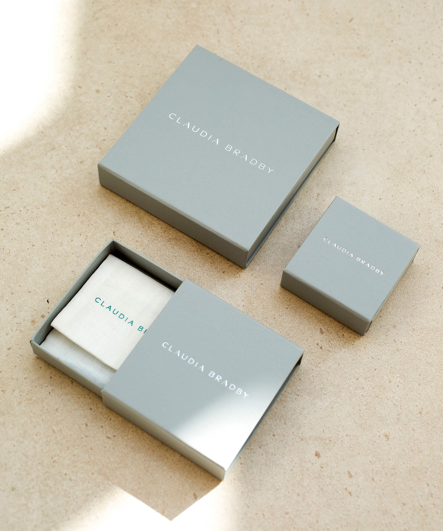 Large Baroque pearl and silver charm necklace, on adjustable cord