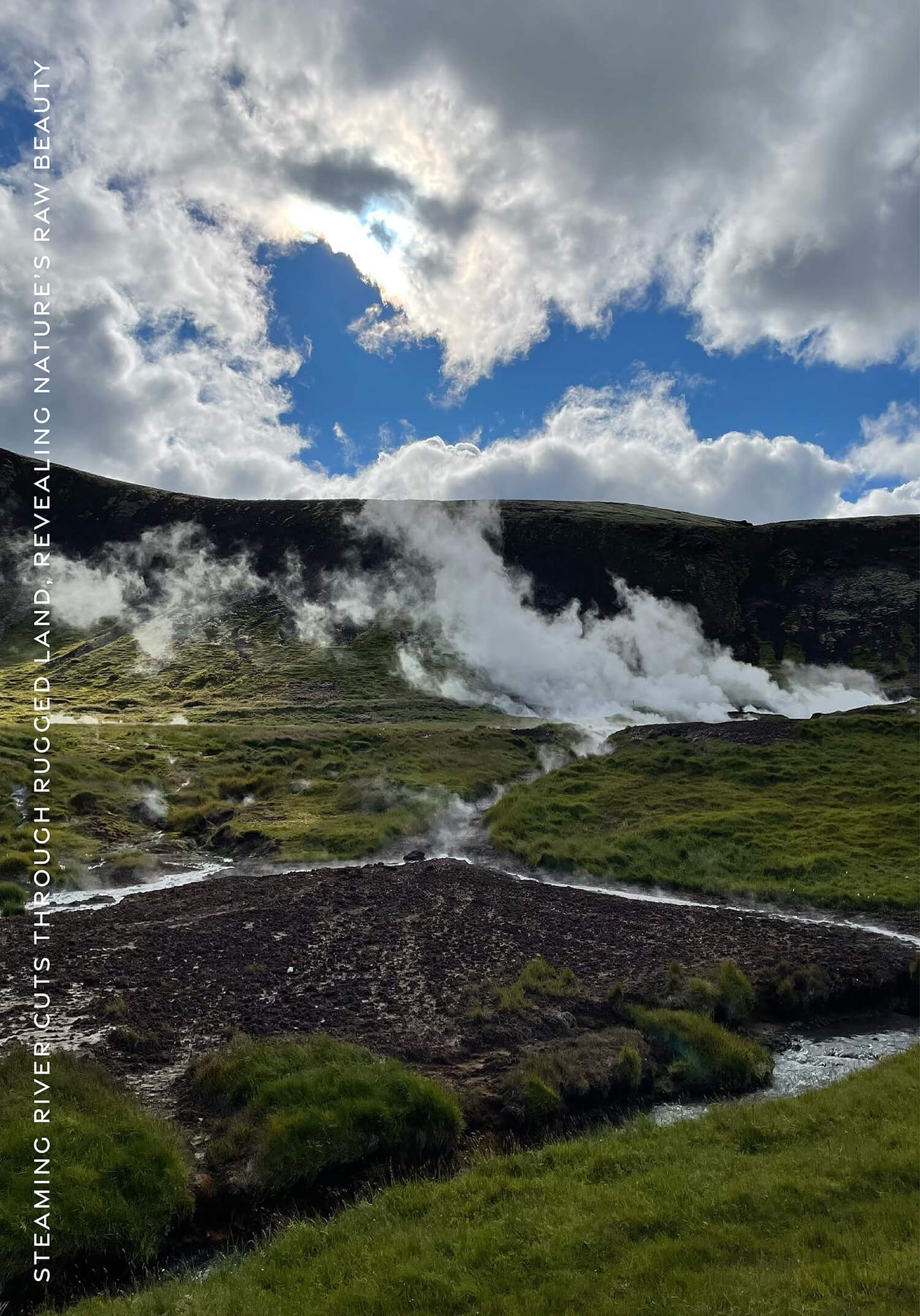 Steaming river cuts through rugged land, revealing nature’s raw beauty
