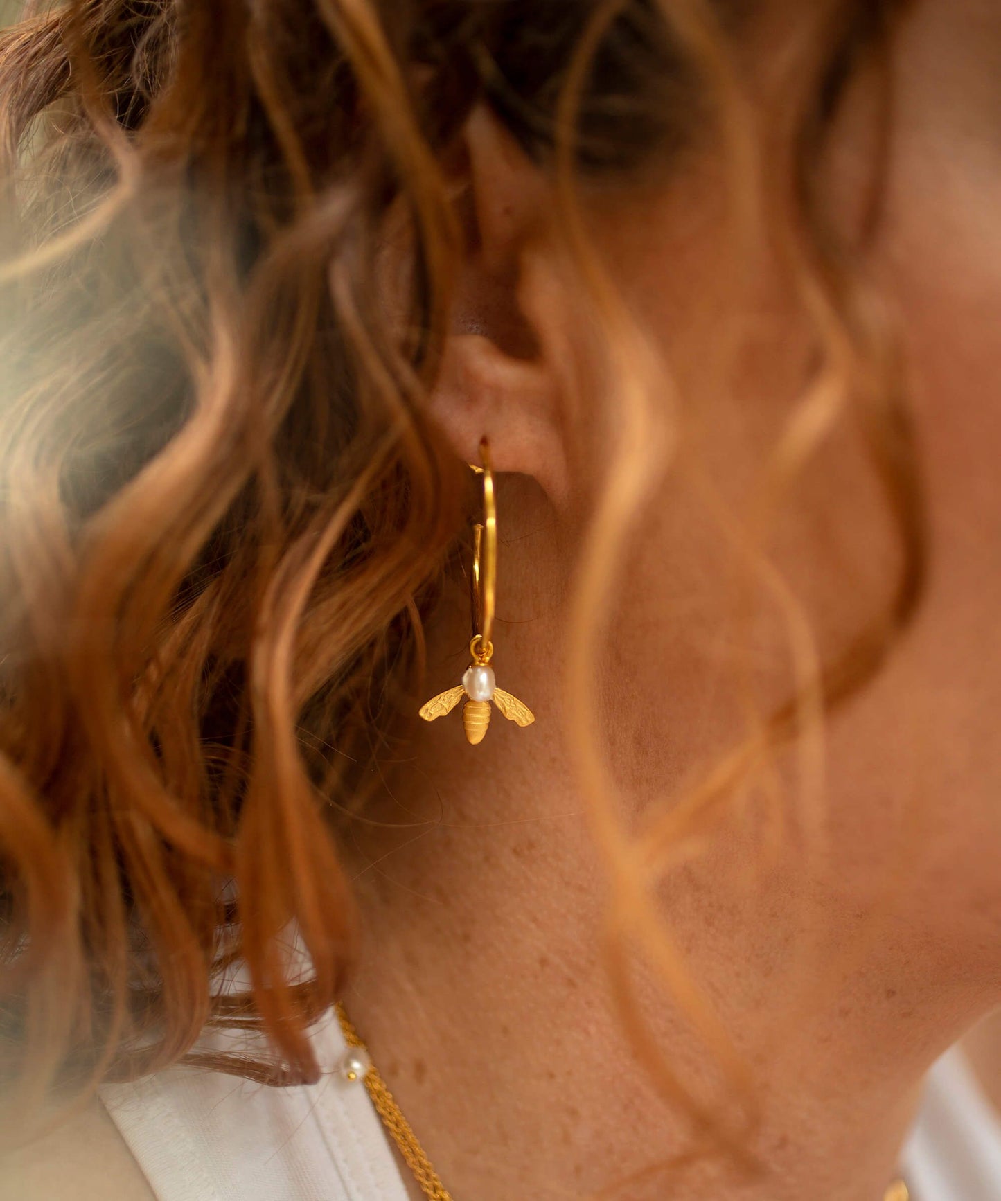 Flying bee gold hoop earrings