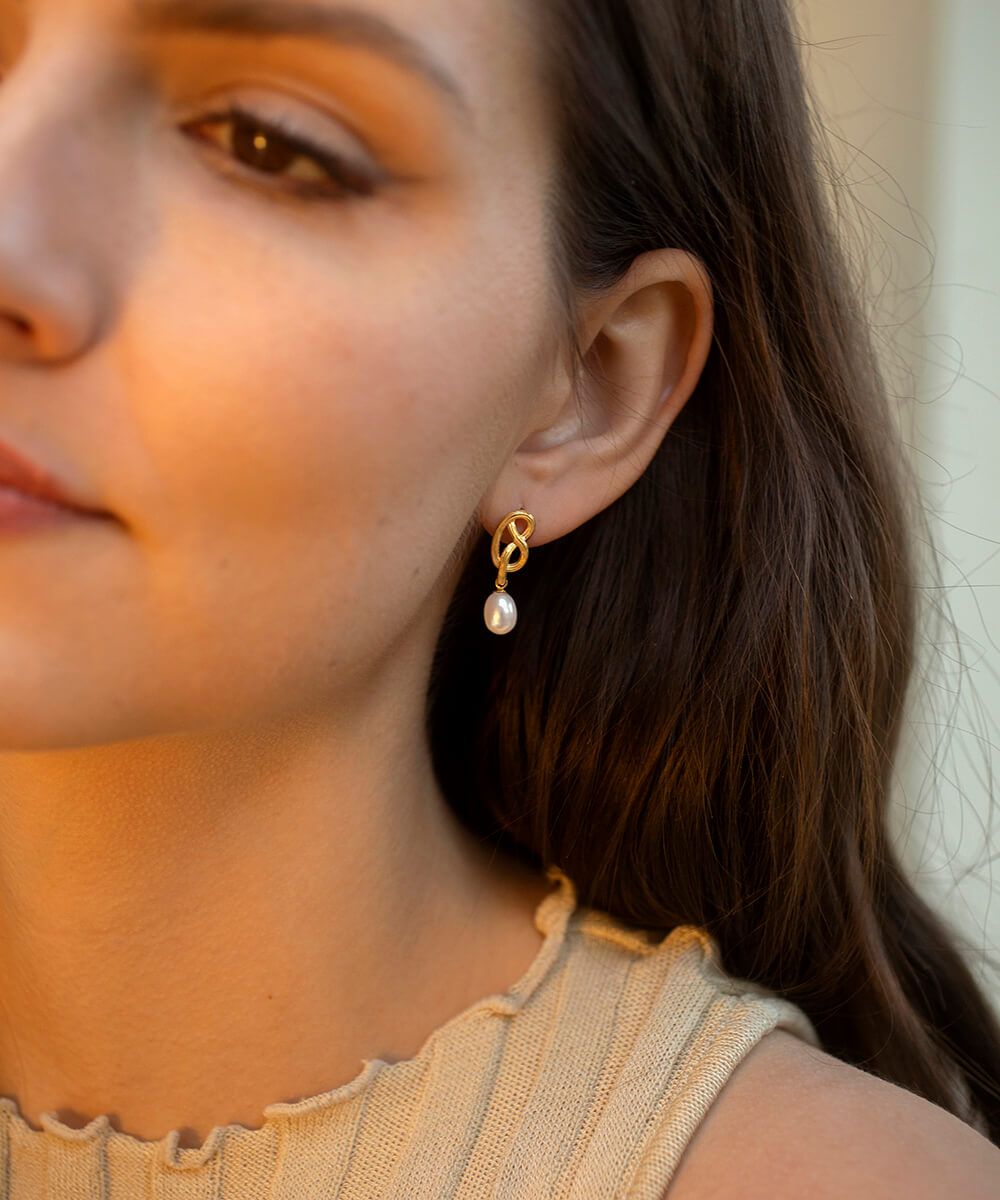 Medium love knot pearl drop earrings, gold