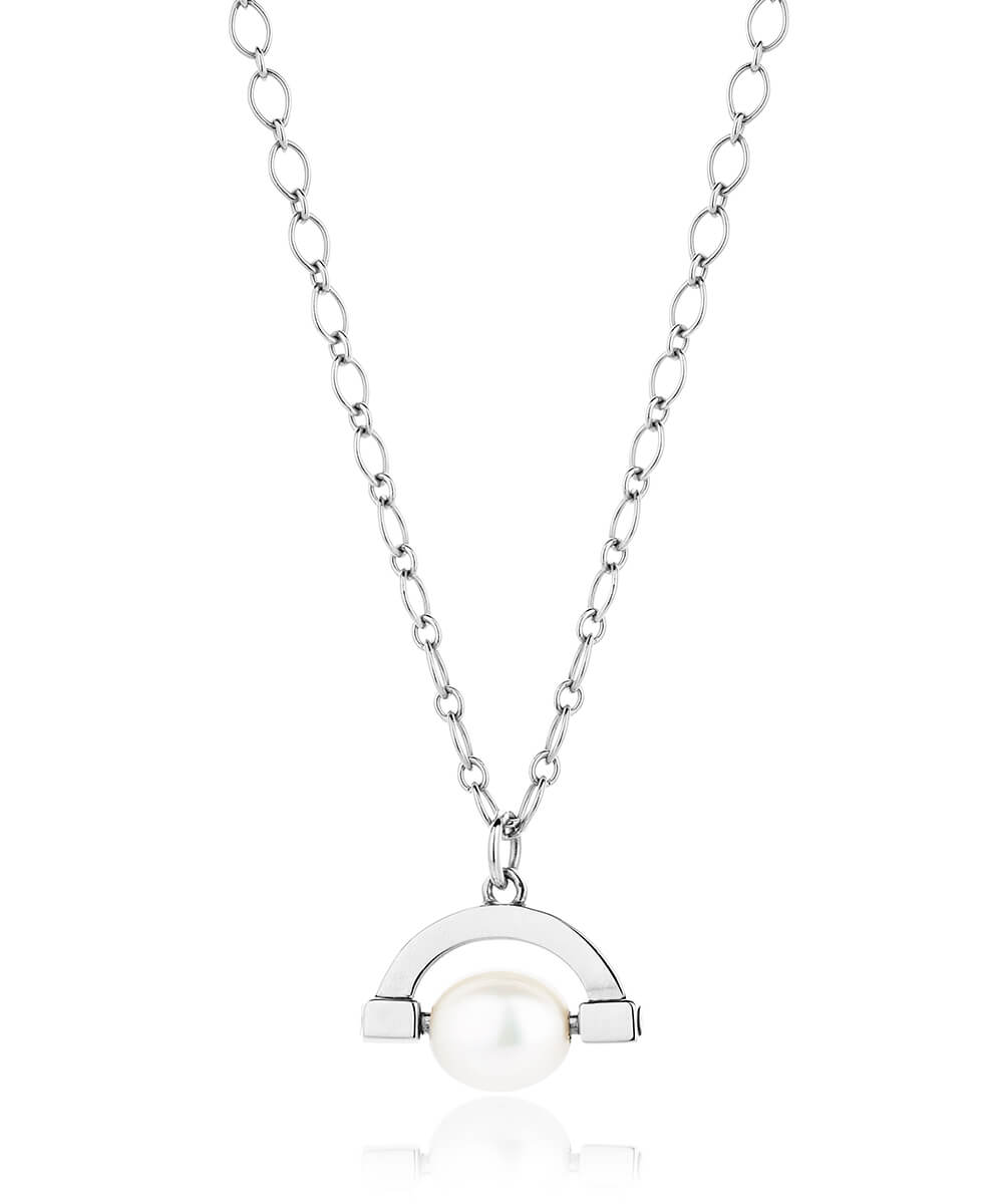 Meditative silver pearl spinner necklace