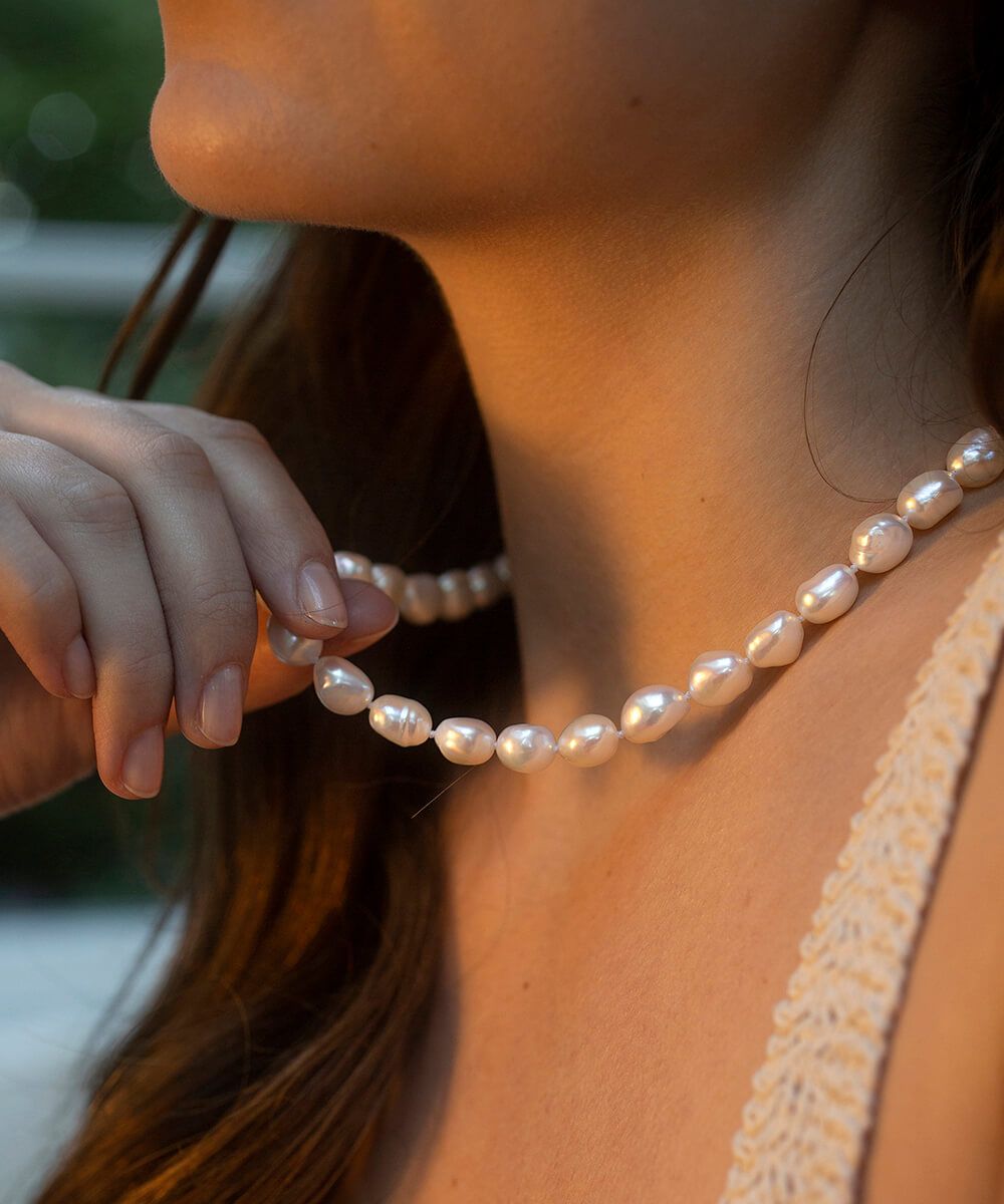 Knotted on sale pearl necklace