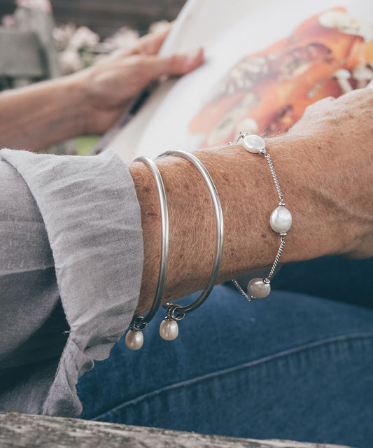 Silver and pearl bangle bracelet stack